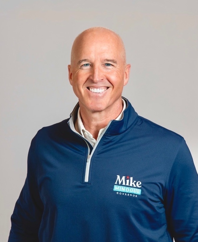 Mike Minogue speaking at a campaign event